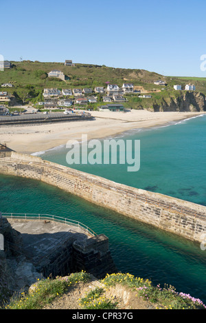 Portreath seaside village beach and pier from the cliff edge on Lighthouse hill.  Cornwall UK. Stock Photo