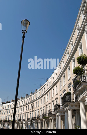 stuccoed 1840s terraced houses forming part of royal crescent, designed by robert cantwell, in notting hill, london, england Stock Photo