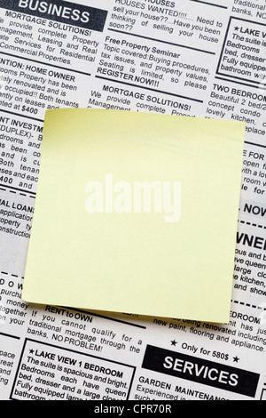 Classified Sticky Note Fake Classified Ad, newspaper and sticky note Stock Photo - Alamy