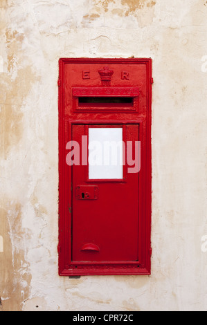 A British wall post box with a ER cipher, Mdina, Malta. Stock Photo