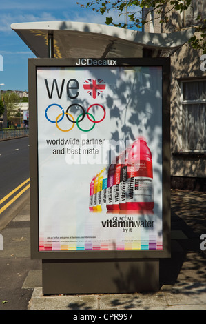 JCDecaux advertising billboard for GLACEAU VITAMIN WATER Olympic partner on bus shelter in Newport South Wales UK Stock Photo