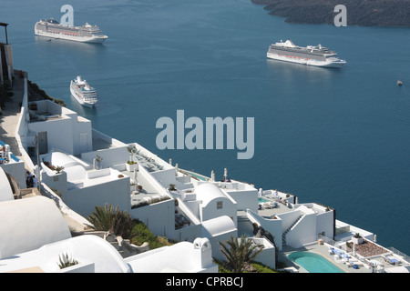 Southern view from Imerovigli on Santorini with cruise ships in the harbour Stock Photo