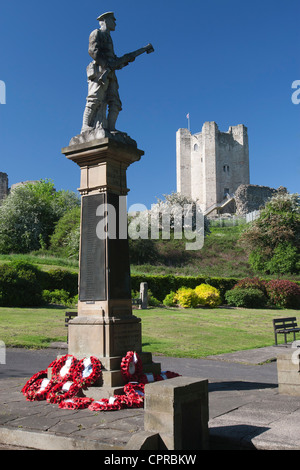 War memorial in Coronation Park with Conisbrough Castle in background, Conisbrough, Doncaster, England, UK Stock Photo