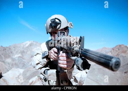 US Navy SEALs during desert combat training Stock Photo