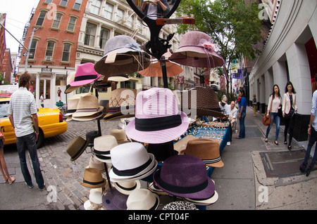 Hats on display on the street in the Soho neighborhood in New York on Friday, May 25, 2012. (© Frances M. Roberts) Stock Photo