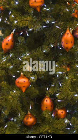 closeup image of a christmas tree decorated with orange balls stock photo - Orange Christmas Tree Decorations closeup image of a christmas tree decorated with orange balls stock photo - Orange Christmas Tree Decorations