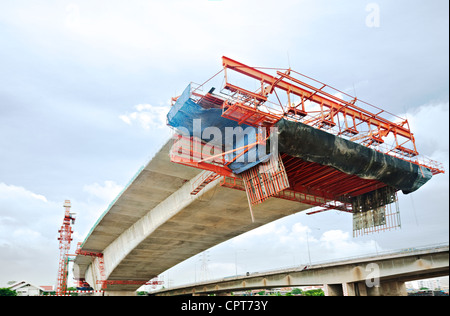 Bridge under construction in Bangkok, Thailand, viewed from below. Stock Photo