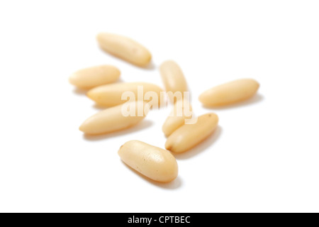 Delicious pine nuts isolated on white Stock Photo