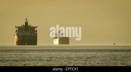 WESER Bulk carrier and other tanker anchored off Vancouver, BC, Canada Stock Photo