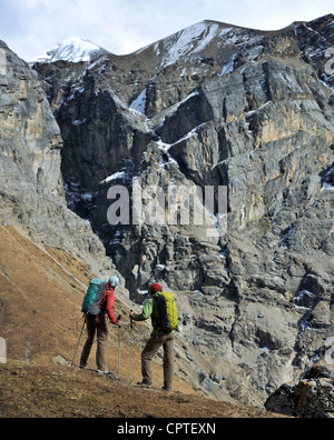 Trekker hiking a ridge in Yak Kharka, Nepal Stock Photo