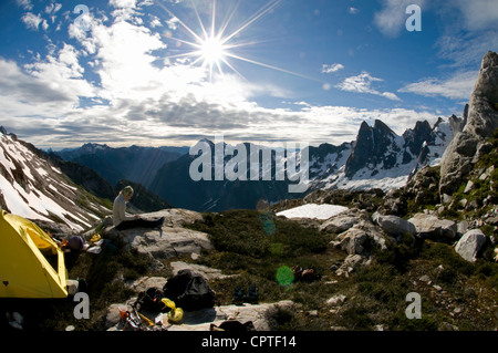 Backpacker at mountain camp, Picket Pass, North Cascades National Park, WA, USA Stock Photo