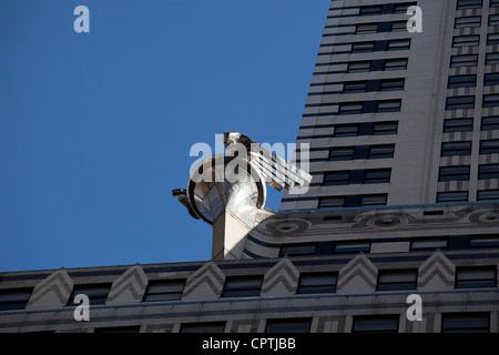 Eagle wing spotlights detail on the Chrysler Building at 42nd St and Lexington Avenue, New York City. Stock Photo