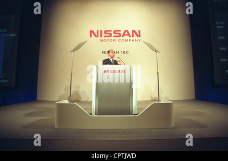 Carlos Ghosn, president and chief executive of Nissan speaks at a press conference in Tokyo, October 23, 2002 Stock Photo