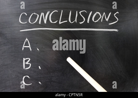 List of conclusions written on the chalkboard Stock Photo