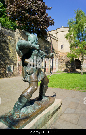 Statue of Robin hood the famous archer outside Nottingham castle walls and gate house, Nottingham, Nottinghamshire England UK GB EU Europe Stock Photo