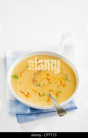 Classic Spanish soup, onion with sherry, almonds and saffron, in a tasty vegetable stock. Light and delicious! Stock Photo