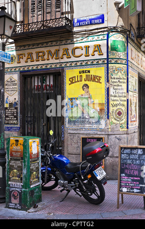 Old tiled advertising on a chemist shop in the Malasana disrict, central Madrid, Spain Stock Photo