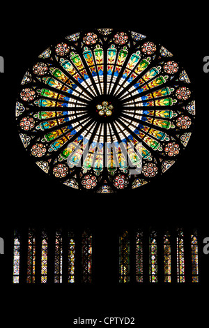 Circular stained glass window in The Cathedral of Notre Dame, Our Lady, at Strasbourg, Alsace, France Stock Photo