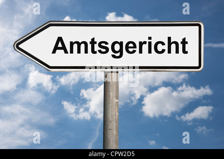 Detail photo of a signpost with the German inscription Local Court. Stock Photo
