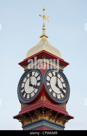 The freshly painted victorian Jubilee clock tower on Weymouth seafront was erected in 1887 to mark fifty years of Queen Victoria’s reign. Dorset, UK. Stock Photo