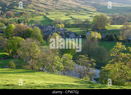 View from above Burnsall village in spring, River Wharfe and distant hillside, Yorkshire Dales national park, North Yorkshire,UK Stock Photo