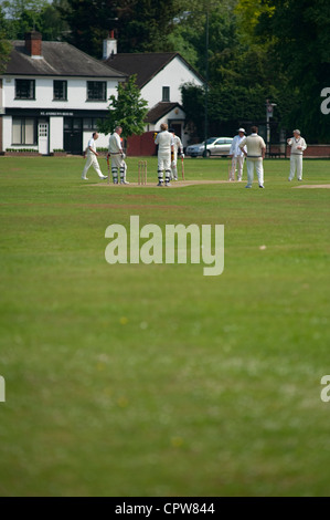 Vllage cricket match at Ham Common in the London Borough of Richmond upon Thames, England, UK Stock Photo