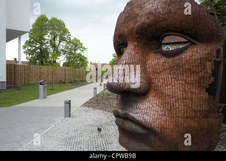 Sculpture 'The Mask' by Paul Kirby, Marlowe Theatre, Canterbury, Kent, UK. Stock Photo