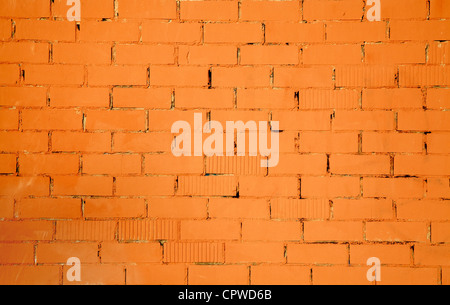 brickwall pattern texture in orange color background Stock Photo