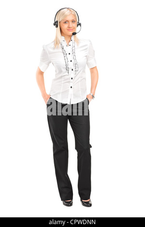 Full length portrait of a blond female customer service operator with headphones and microphone isolated on white background Stock Photo