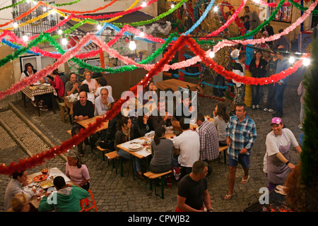 Streets during the Festas dos Santos Populares ( Popular Saints Festival ) in the Alfama district,  Lisbon, Portugal. Stock Photo