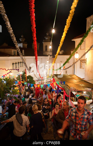 Streets during the Festas dos Santos Populares ( Popular Saints Festival ) in the Alfama district,  Lisbon, Portugal. Stock Photo