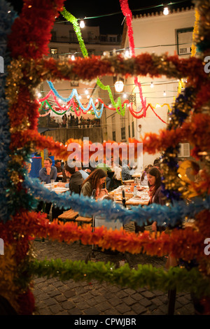 Streets during the Festas dos Santos Populares ( Popular Saints Festival ) in the Alfama district,  Lisbon, Portugal. Stock Photo