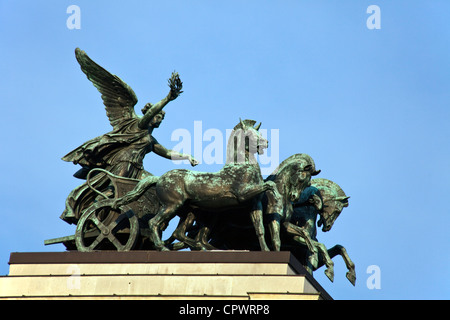 quadriga or chariot pulled by four horses and steered by the goddess Nike on the roof of the parliament Stock Photo