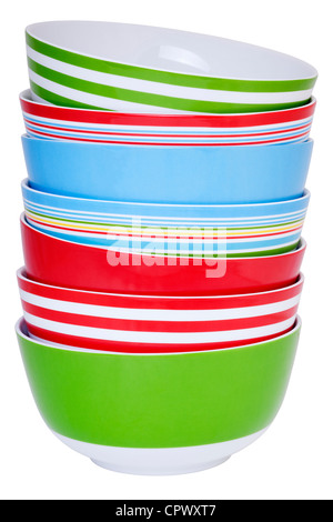 Stack of colourful bowls isolated on white. Chinese import. Stock Photo