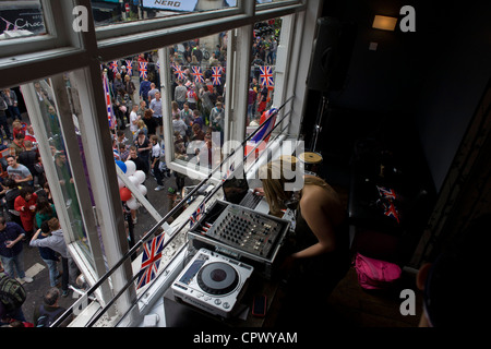 Soho celebrates the Queen's Diamond Jubilee weeks before the Olympics come to London. The UK gears enjoys a weekend and summer of patriotic fervour as their monarch celebrates 60 years on the throne. Across Britain, flags and Union Jack bunting adorn towns and villages. Stock Photo