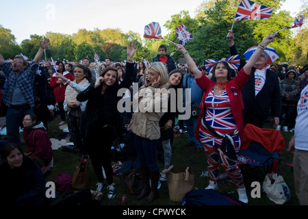 Monarchists celebrate their Queen's Diamond Jubilee weeks before the Olympics come to London. The UK gears enjoys a weekend and summer of patriotic fervour as their monarch celebrates 60 years on the throne. Across Britain, flags and Union Jack bunting adorn towns and villages. Stock Photo