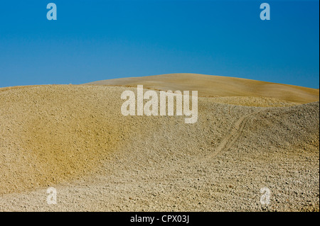 Tuscan parched landscape sun-baked soil in Val D'Orcia, Tuscany, Italy Stock Photo