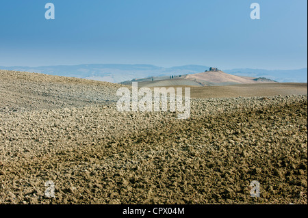 Tuscan parched landscape sun-baked soil in Val D'Orcia, Tuscany, Italy Stock Photo