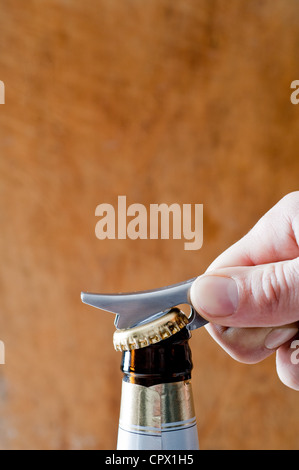 Opening a bottle of beer Stock Photo