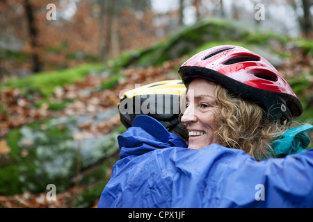 Older couple wearing cycling helmets Stock Photo - Alamy