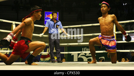 Muay Thai boxers in preparation for a bout in the Rajadamern Stadium in Bangkok, Thailand. Stock Photo