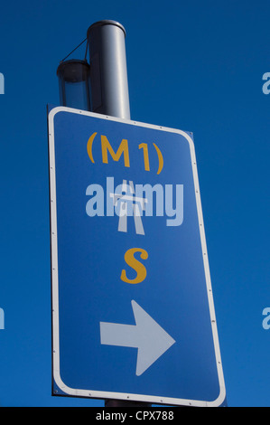 Closeup of a street sign pointing toward the M! freeway, South bound Stock Photo