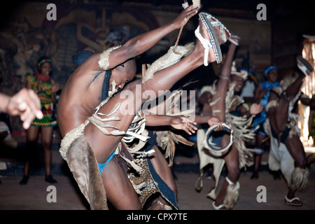 A group of traditional African male dancers dance Stock Photo