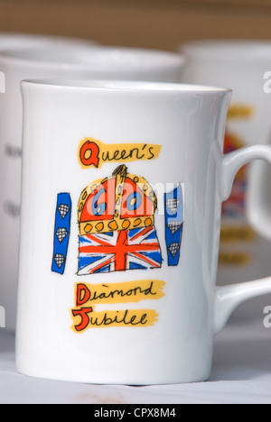 Commemorative mug to celebrate the Queen's Diamond Jubilee, Rowledge Village, Surrey/Hampshire border, UK. 3 June 2012. Stock Photo