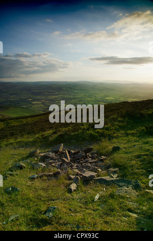 Vale of Clwyd viewed from Moel Famau in the Clwydian Hills as the sun sets over the horizon, Moel Famau, Wales, UK Stock Photo