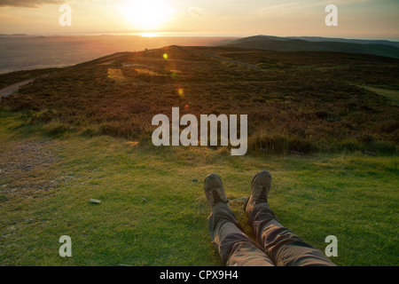 Hill walker on the top of Moel Famau, highest point in the Clwydian Range Stock Photo