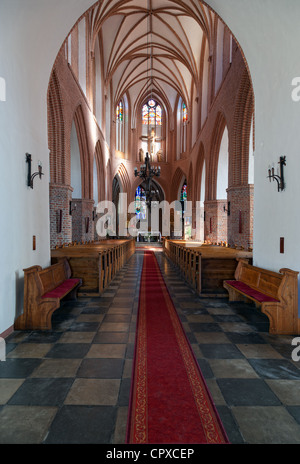 Gothic parish church of Our Lady of Perpetual Help, built in 1338 in Swidwin, Poland. Stock Photo