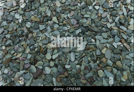 Crushed slate with a mix of tones and hues, predominately green. Stock Photo