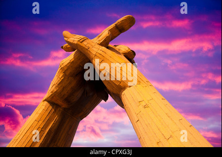 Sunset over a sculpture at the Blacksmiths shop in Gretna Green, Scotland, UK. Stock Photo