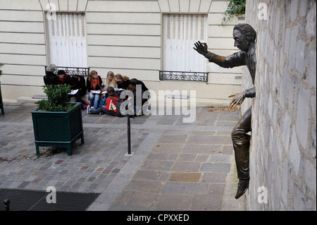 France, Paris, Montmartre, Place Marcel Ayme, Le Passe Muraille by Jean Marais Stock Photo